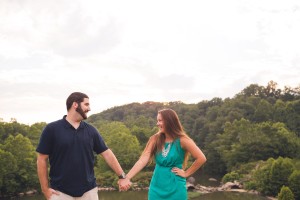 lake linganore dam engagement photography frederick md holding hands