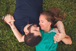 lake linganore dam engagement photography frederick md in grass