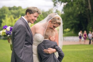 son cries happy tears at moms wedding photography
