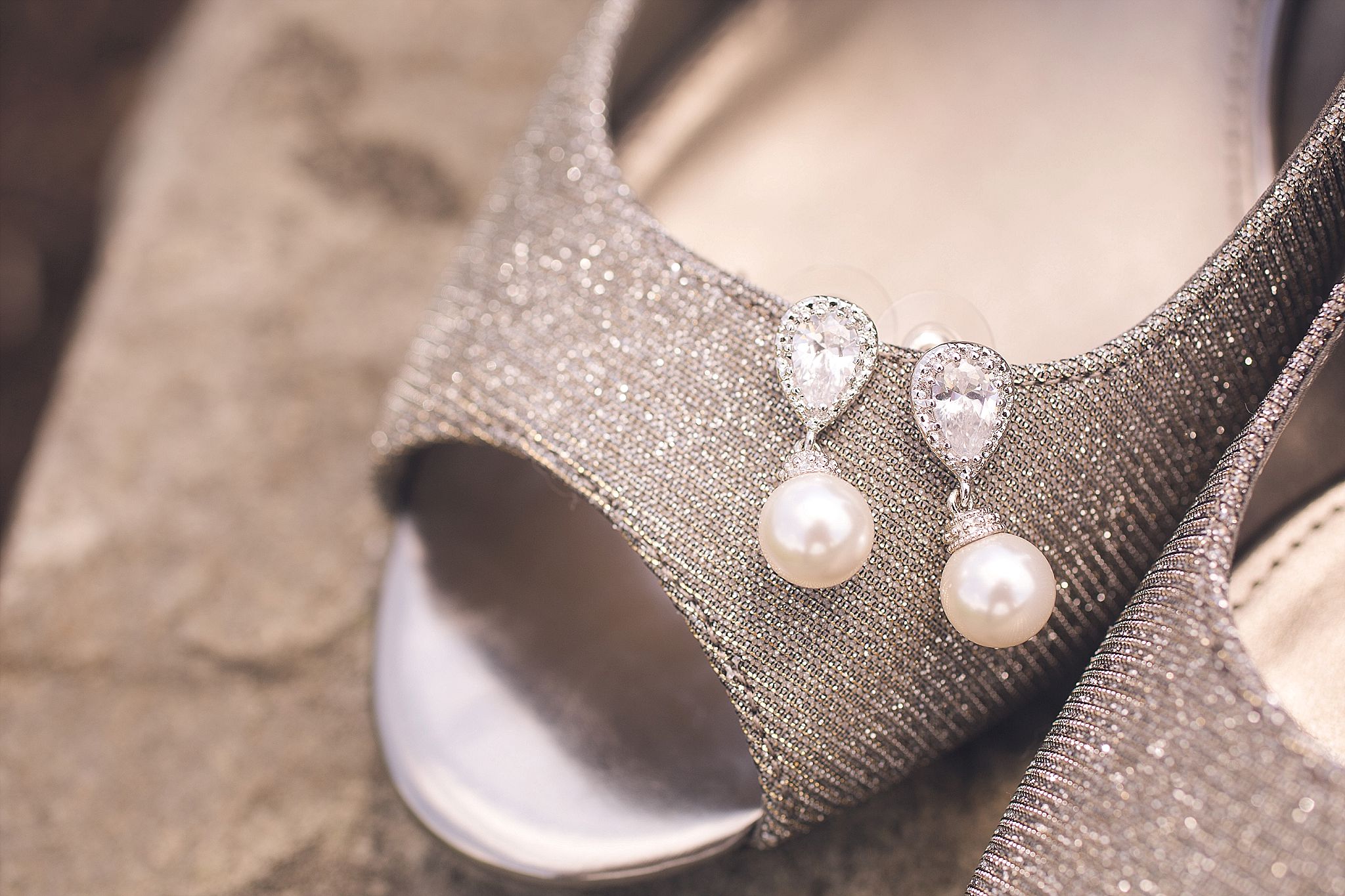 shoe and earrings wedding day details photography