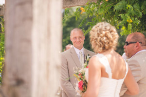 groom sees bride walking down aisle photography frederick