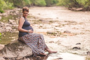 pregnant woman in creek frederick photography