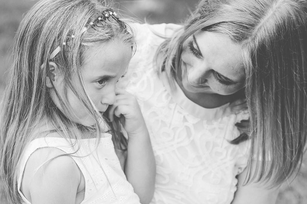 mom looks at daughter after outdoor wedding ceremony in dc 