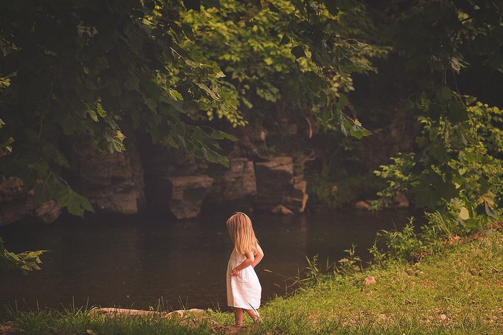 girl in white dress near creek at dc wedding photography session