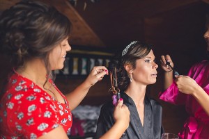 bride gets hair fixed before wedding