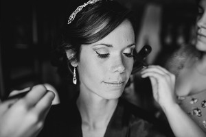 bride gets make up done before wedding in baltimore