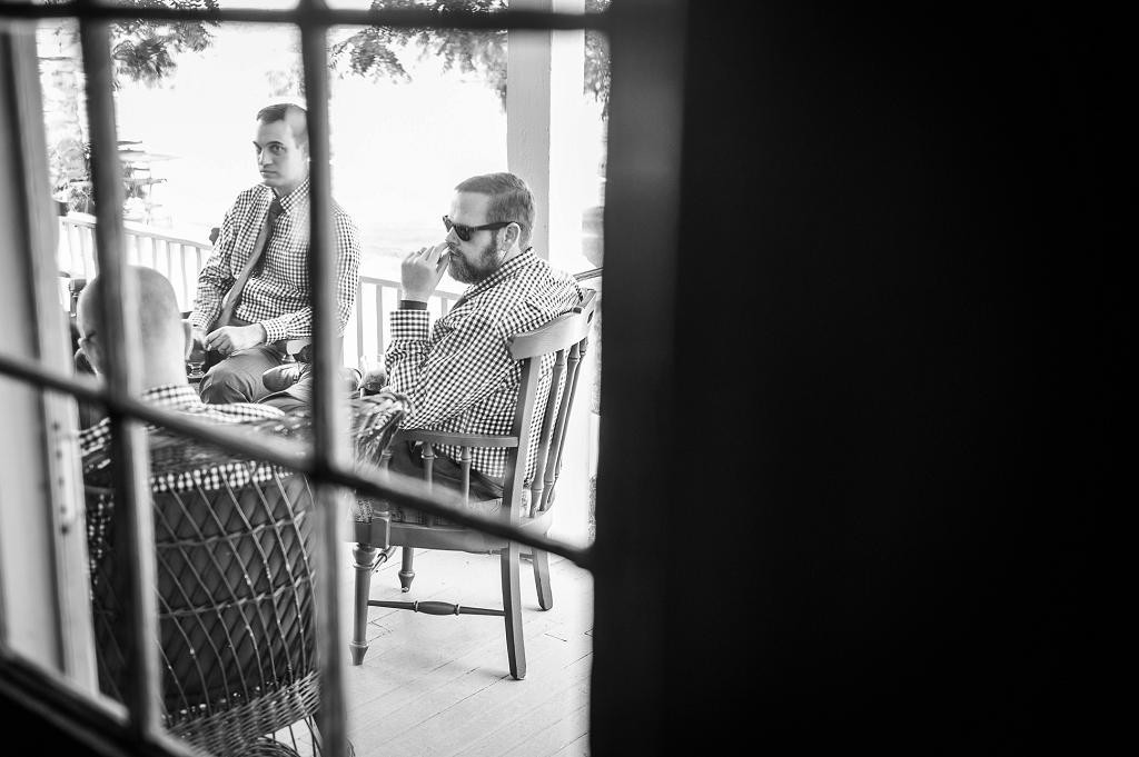 Washington DC Wedding Photography with groomsmen through the window