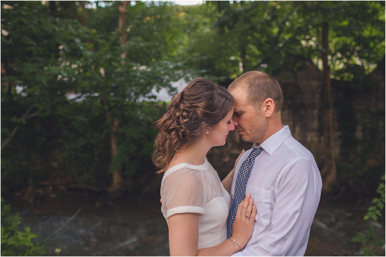 cumberland wedding photography near river with bride and groom
