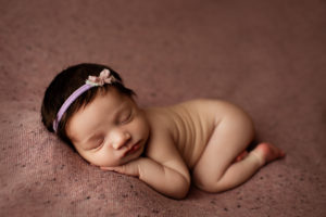 cumberland newborn photographer poses baby